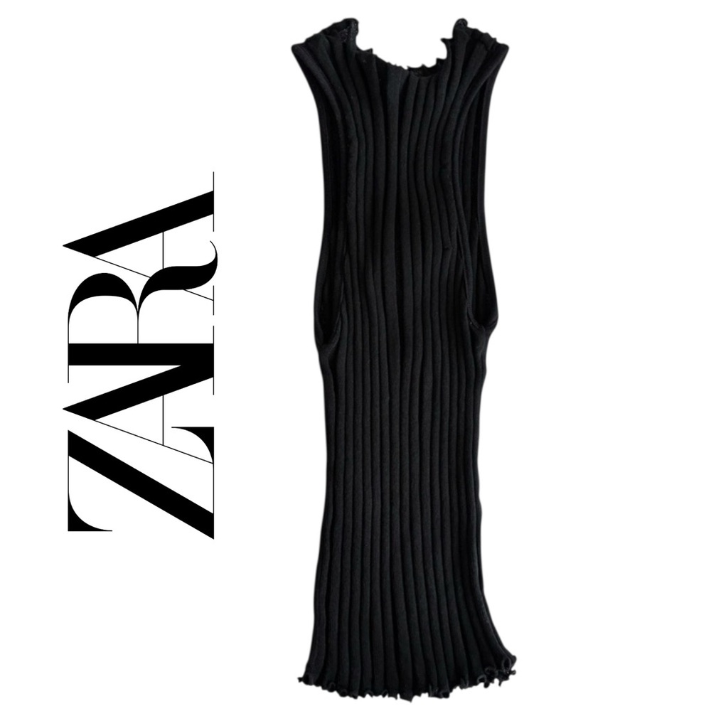 Fine knit top with high neck and sleeveless design